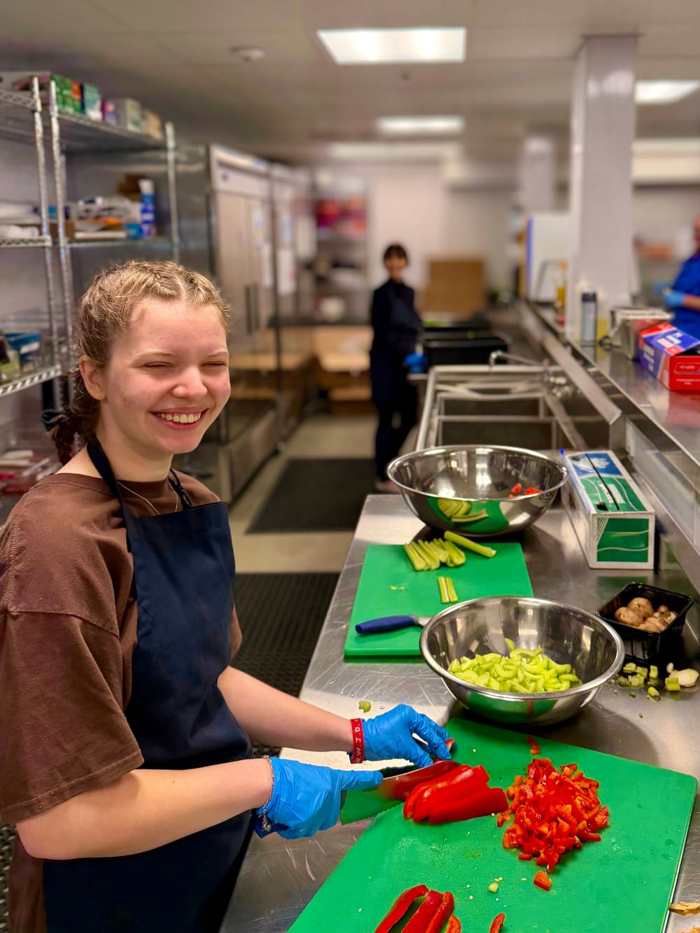 Morning Star Christian Church volunteer preparing fresh vegetables for the Boise homeless-shelter cooking ministry and Sunday community breakfast